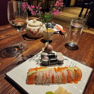 Special roll, yellow tail roll, plum wine, green tea