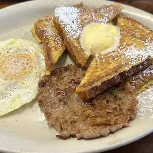 French toast w eggs and meat. The sausage patty is really good, a must try!