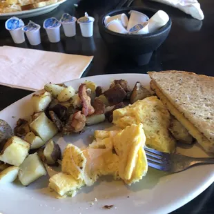 Cheese omelette, rye toast and home fries