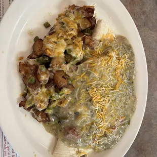 Huevos rancheros with sausage and green chili -  chef's favorite and mine too. Get a side of bacon too. They're bacon is excellent.