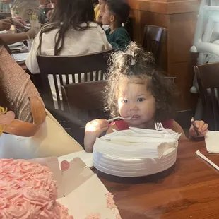 My niece enjoying the cake