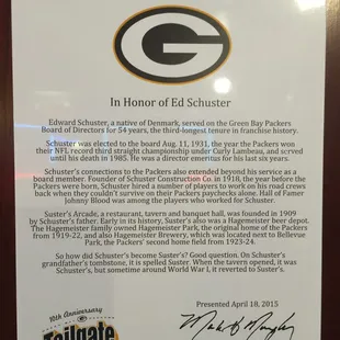a plaque describing the history of the green bay packers