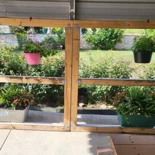 Seating area surrounded by beautiful flowers