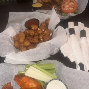 Buffalo Wings  Cheese curds Sutherland&apos;s burger