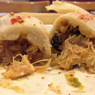 Shredded chicken inside the tamales