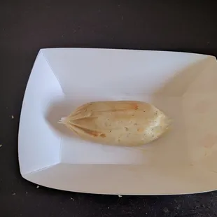 Tamale ($3.50) - Tiny bite sized tamale with hard masa that does not even come with sauce. Terrible.