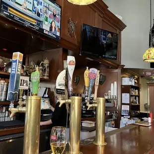 a bar with beer taps