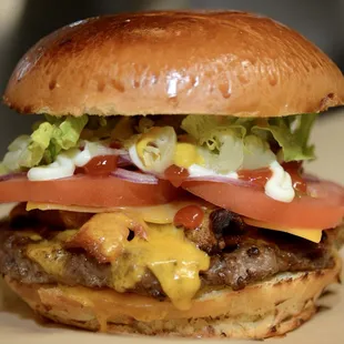 Angus beef cheese burger plus applewood smoked bacons