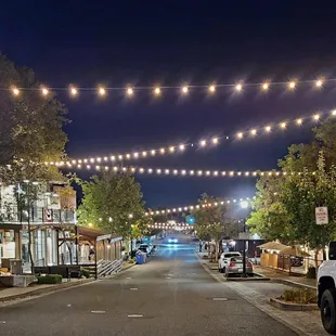 a view of a street at night