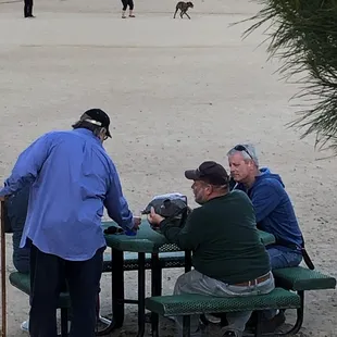 Jabronis drinking alcohol and smoking weed in the park.