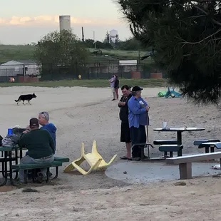 Weed smoking with one guy trying to cover the other. But did a terrible job of it