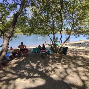 A lot of beach space, shade, and shallow water goes quite a ways out.