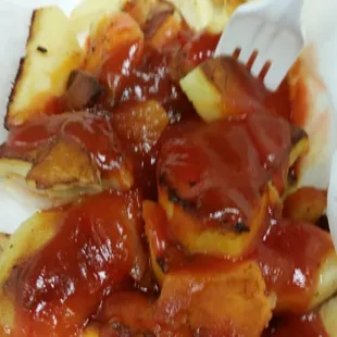 The not so healthy but, delicious portion of my breakfast.  Home fries and onions with ketchup and hot sause