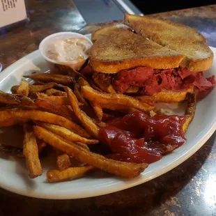 Reuban sandwich with french fries
