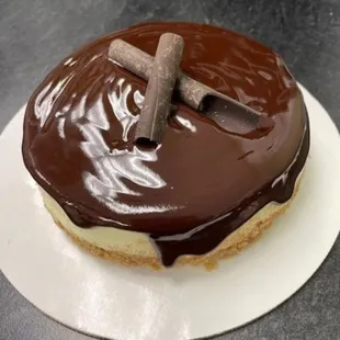 Chocolate ganache covered cheesecake