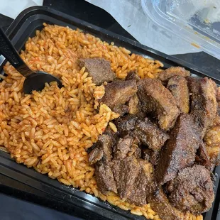 Beef suya A Plate of Jollof Rice