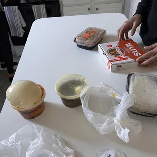 Egusi stew and fufu, Ayamase with white Rice chicken suya and lamb suya. No jollof rice included