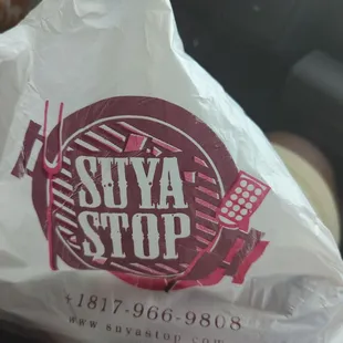 To go order in their customized plastic bag.