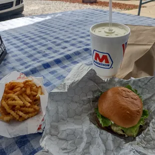 Enjoying a Double Cheeseburger and fries on a nice sunny afternoon