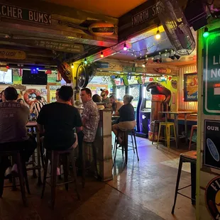 people sitting at the bar
