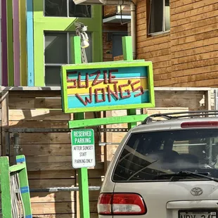 Sign for Suzie Wong&apos;s Hideaway - Daytime Parking Only