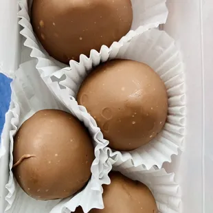 four chocolate eggs in a box