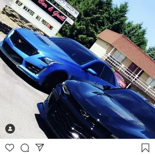 two cars parked in a parking lot