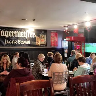 a group of people sitting at a table