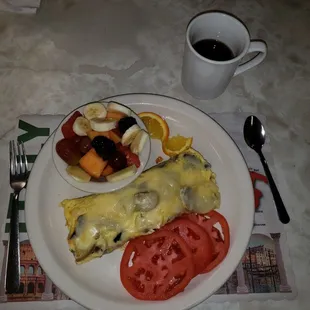 Mushroom and Cheese Omelet was amazing!!  The tomatoes and fruit were fresh and the coffee was nice and hot.