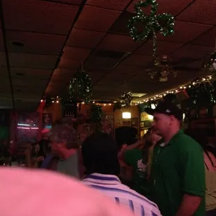 a man in a green shirt