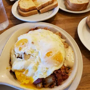 Country Skillet (with the 3 eggs over-easy) and toasts!