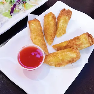 Crispy egg rolls with sweet and sour sauce!