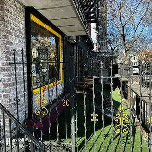 Outside seating area with tables and chairs