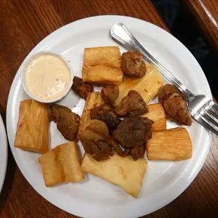 Yucca Frita and pork meat