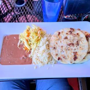 The pupusas, rice and beans $21 including tax and tip