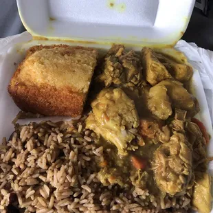 Curried Chicken, rice and peas, corn bread all delicious!