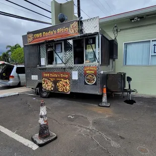 a food truck parked in a parking lot