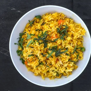 a bowl of rice and vegetables