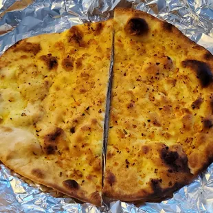Garlic Naan ($4.49) - HH Price $3.14