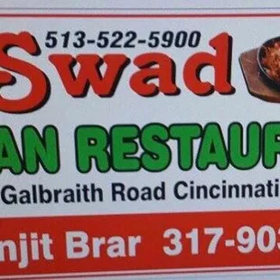 a sign advertising a restaurant