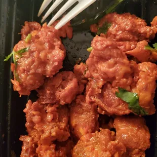 a plate of food with a fork