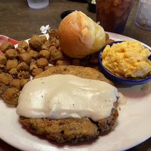 Chicken fried steak, Mac &amp; cheese, fried okra, and a roll.
