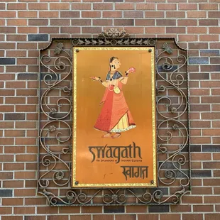 a woman dressed in traditional indian attire