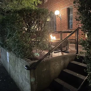 chairs and tables outside Swagat, fire at bar next door