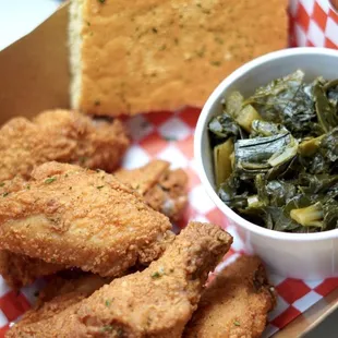 Chicken wings, collard greens and cornbread