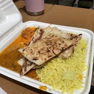 a meal in a styrofoam container