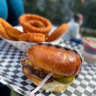a burger and onion rings