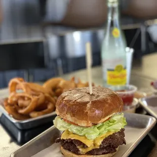 a burger and onion rings