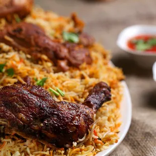 a plate of chicken and rice