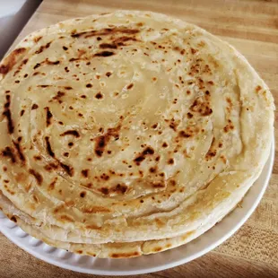 a stack of flatbreads on a plate
